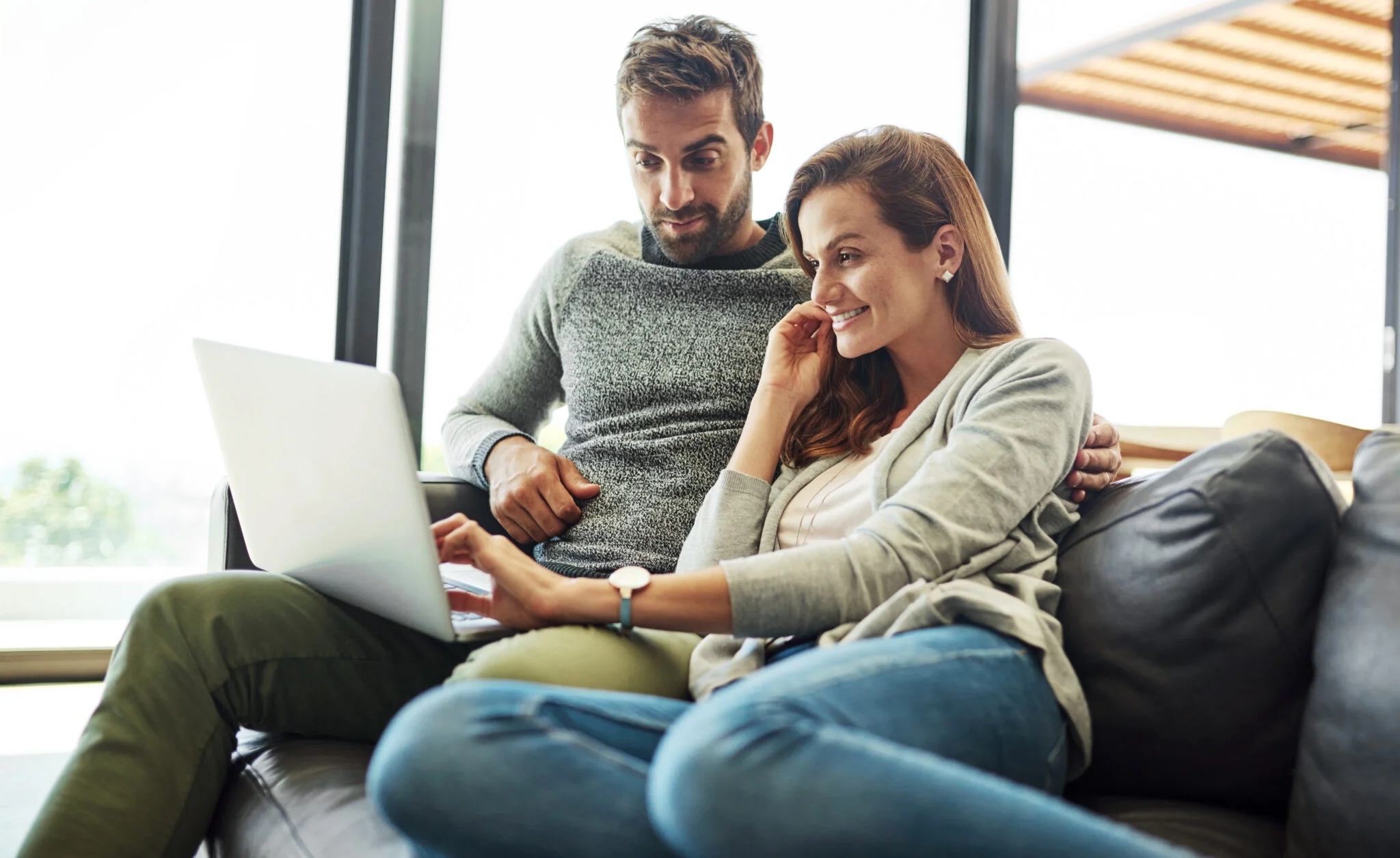 home-couple-laptop-finance-happiness-planning-budget-investment-connection-people-apartment-man-with-woman-computer-conversation-streaming-movies-series-film-2048x1255
